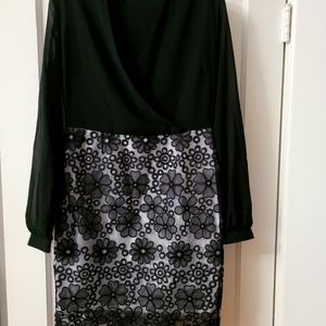 Classic party dress, black and white lace, fitted skirt and black sheer sleeves